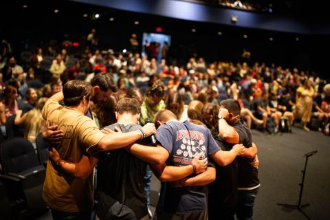 Students gather together in chapel room before service starts